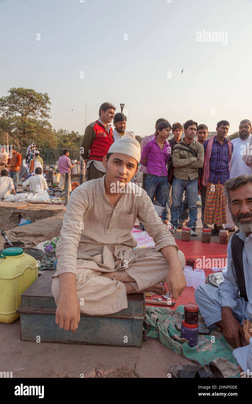 portrait of male hawker selling their goods at Meena Bazaar Market in