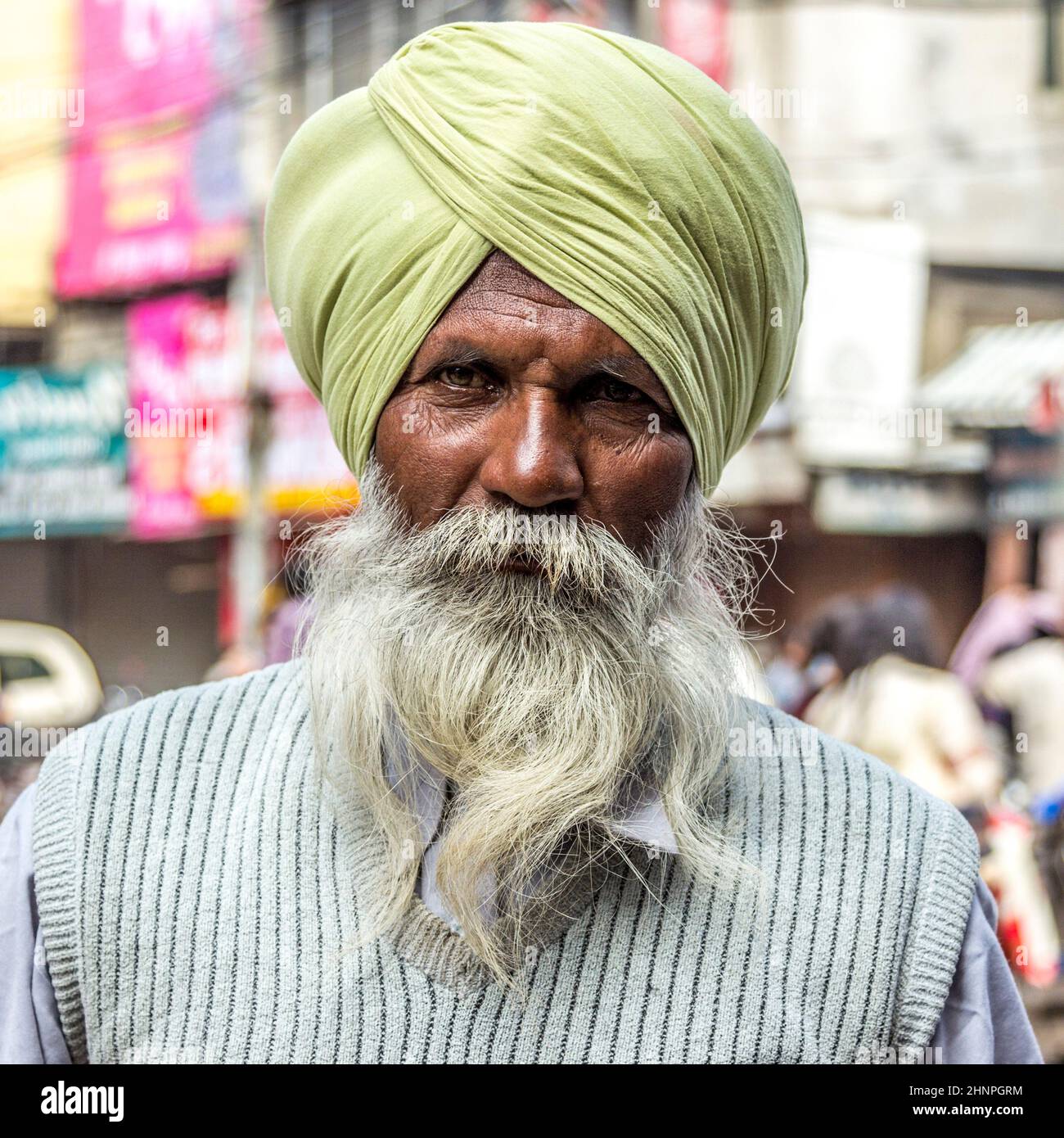 portrait of old Sikh man with typical turban and white beard Stock