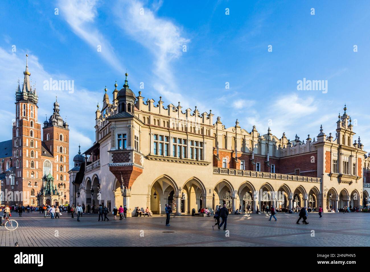 People on the Main Market Square near Sukiennice, Cloth Hall Stock Photo
