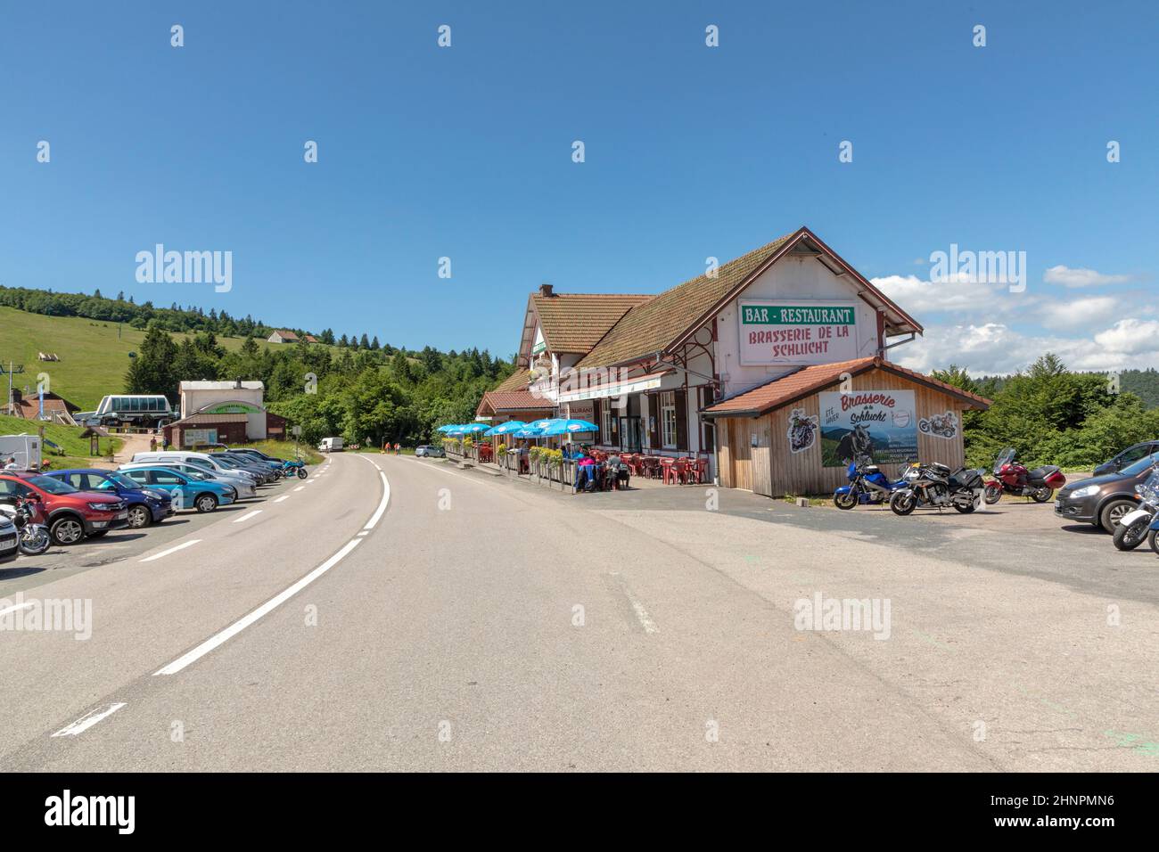 bar, brasserie and parking lot at the col de Schlucht in France. Stock Photo