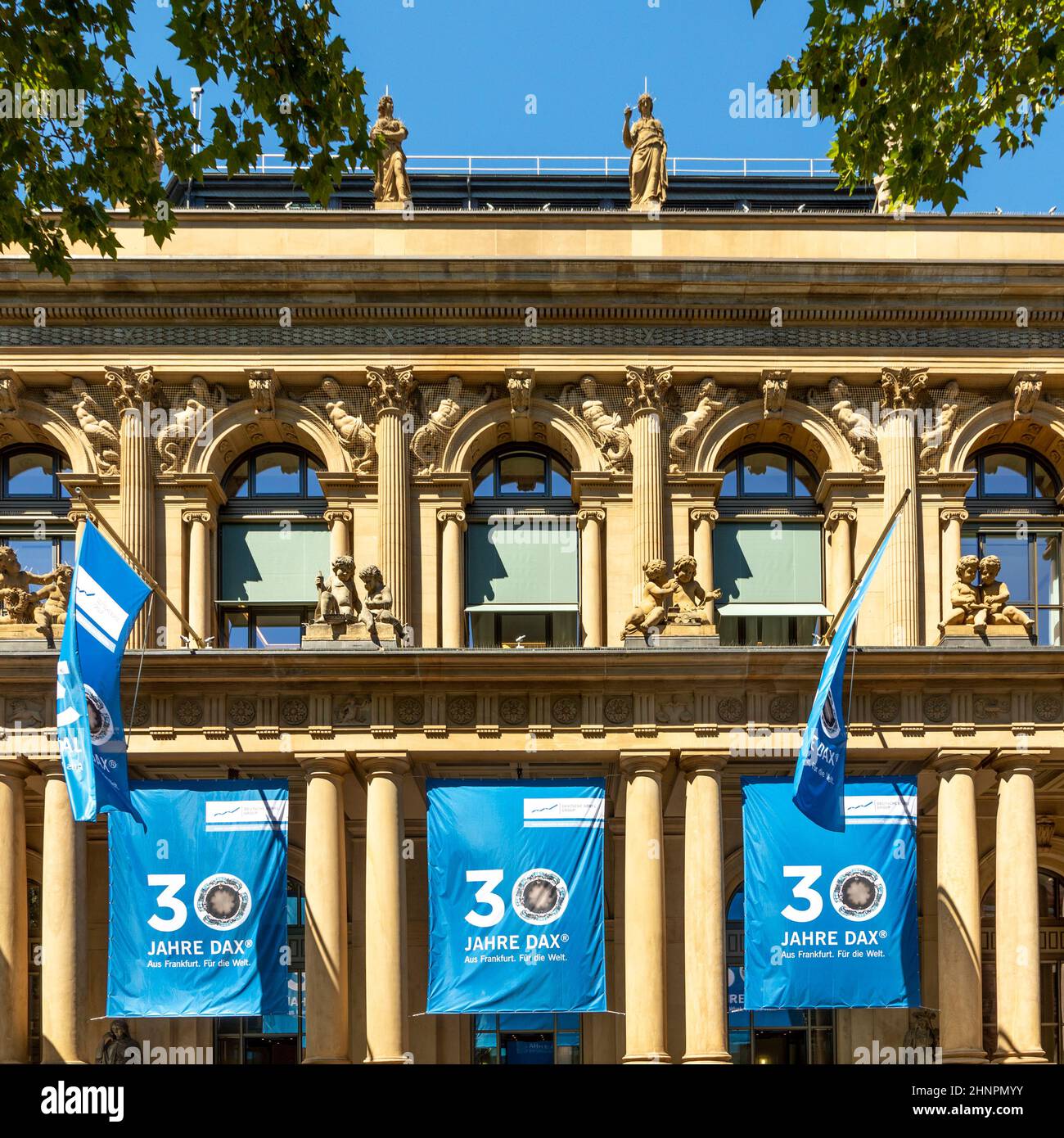 facade of stock exchange with flags to celebrate 30 years of Stock exchange in Frankfurt Stock Photo
