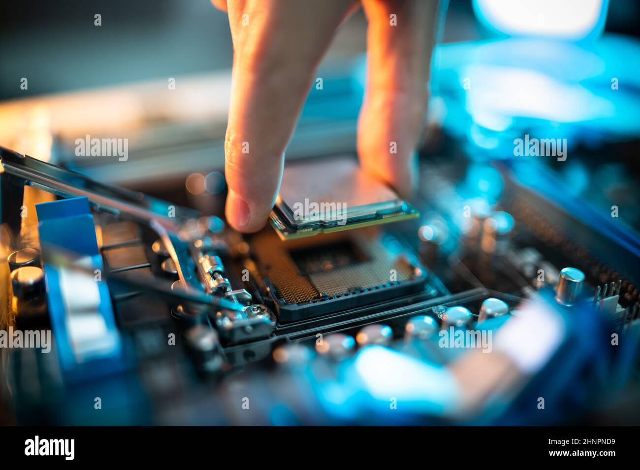 Motherboard Microchip In Hand. Computer Testing And Repair Stock Photo ...
