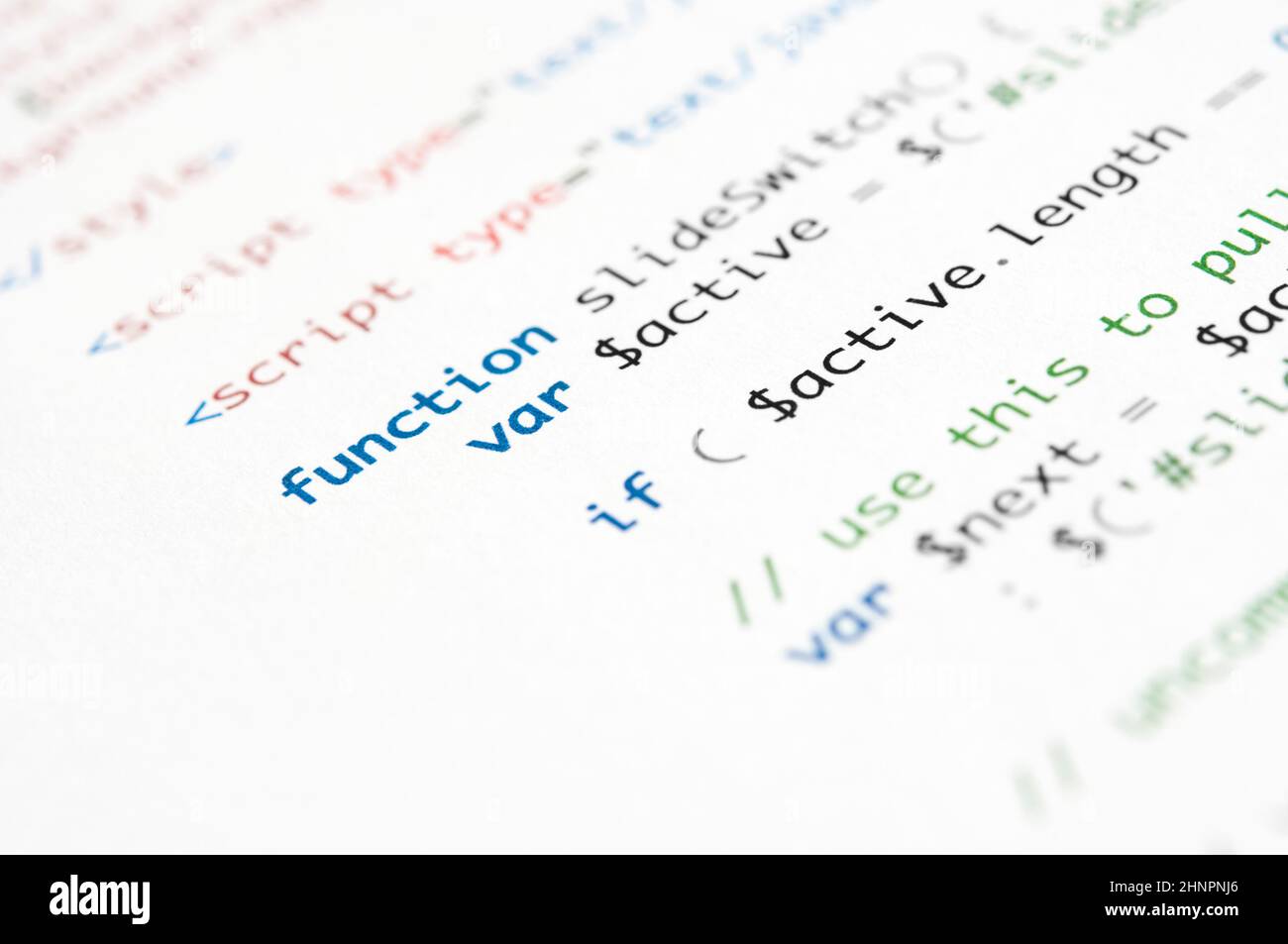 HTML script printed on white paper with shallow depth of field Stock Photo