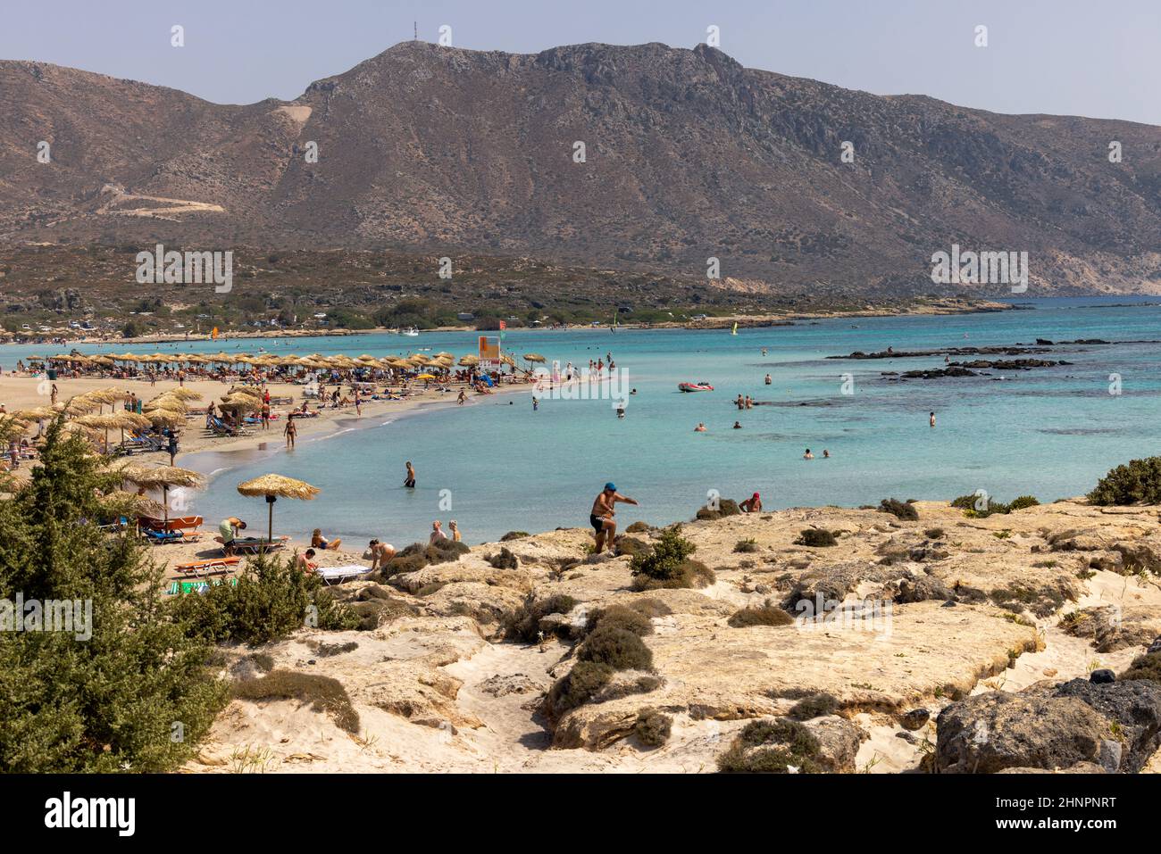 People relaxing on the famous pink coral beach of Elafonisi on Crete Stock Photo