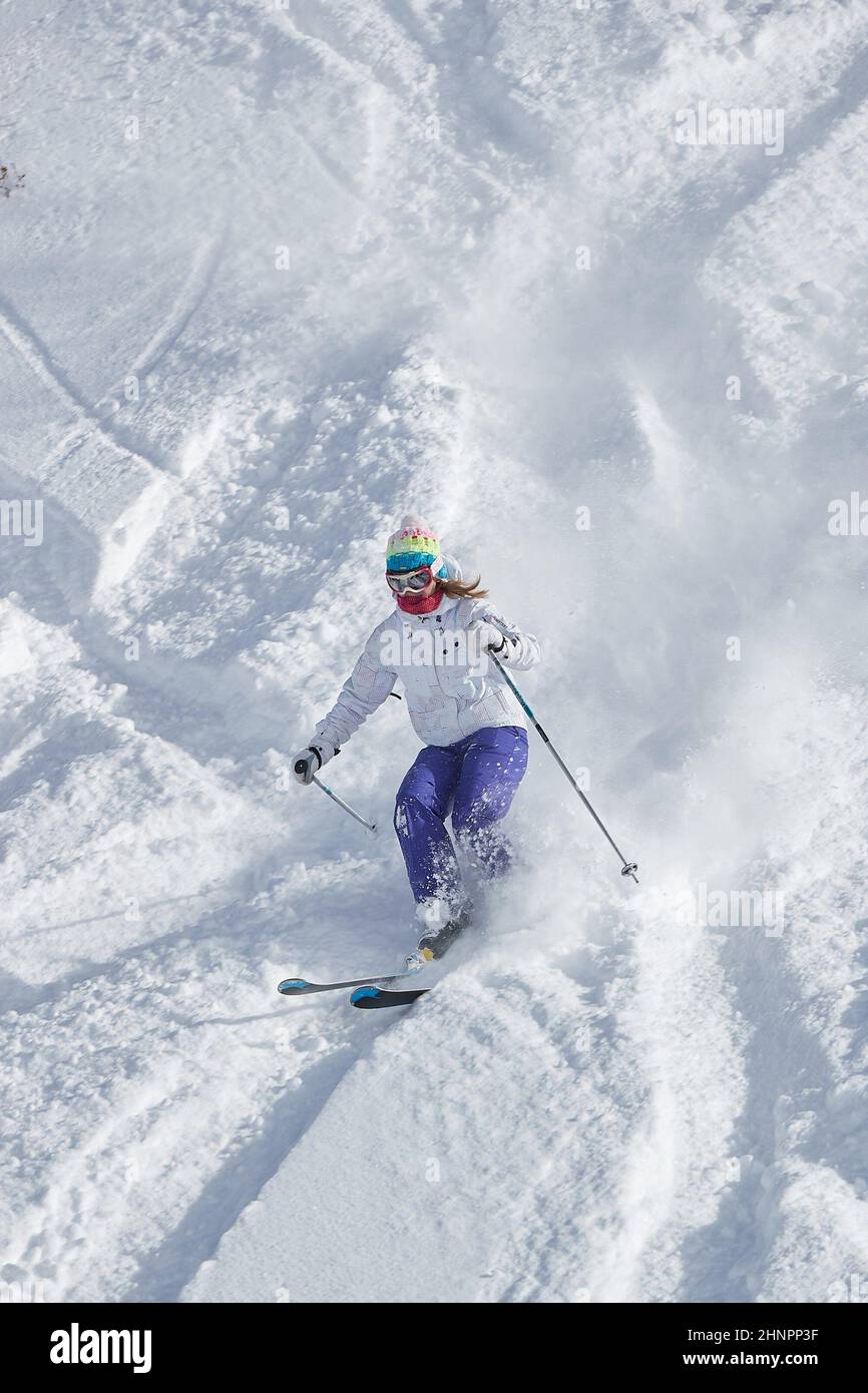 Skiing in fresh powder snow Stock Photo