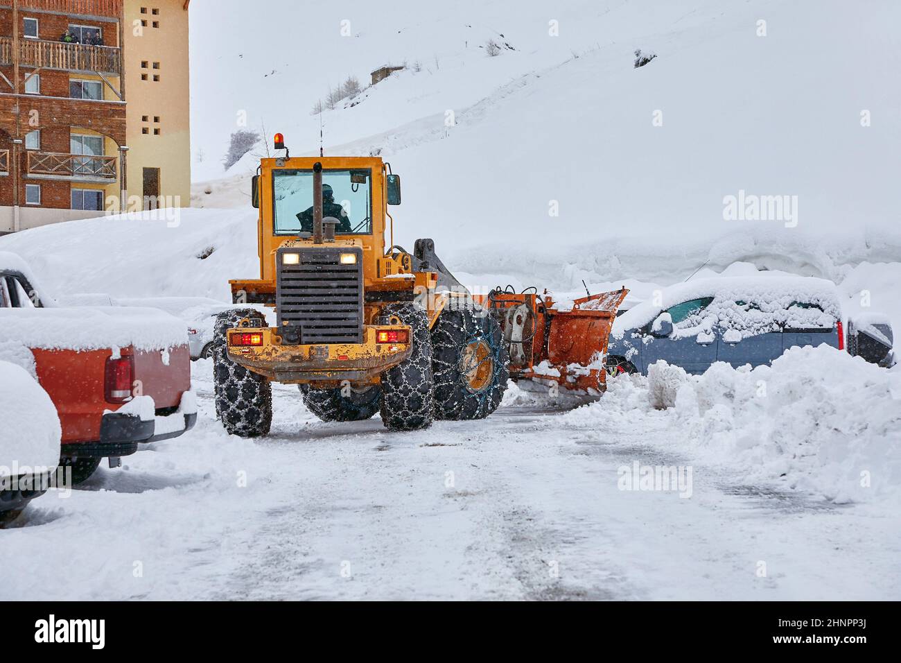 Winter road clearing snowplow Stock Photo