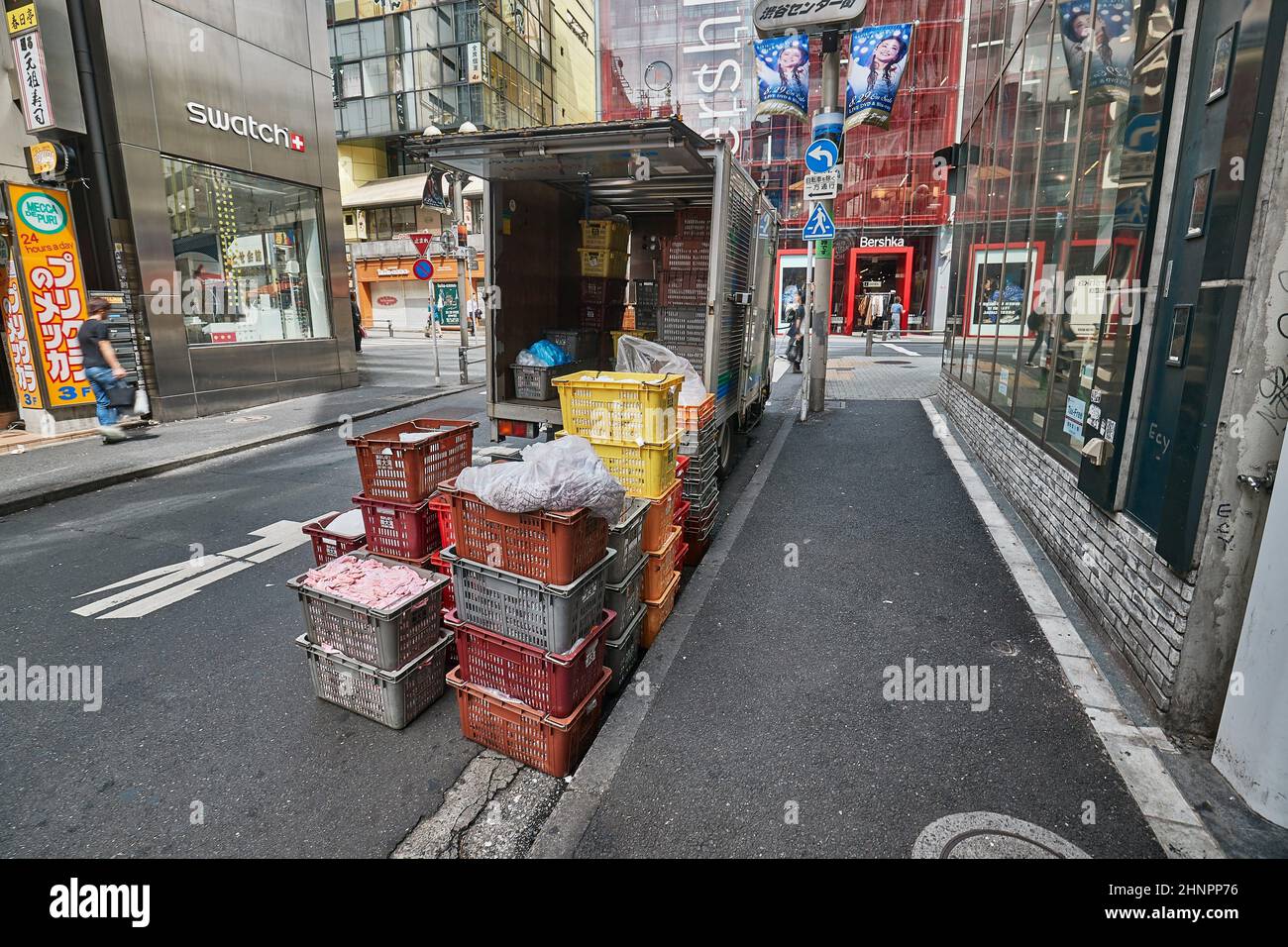 Truck delivering goods to shops in Japan Stock Photo