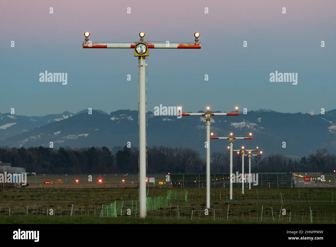 Saint Gallen, Altenrhein, Switzerland, February 9, 2022 Approach lighting system at the beginning of runway 10 Stock Photo