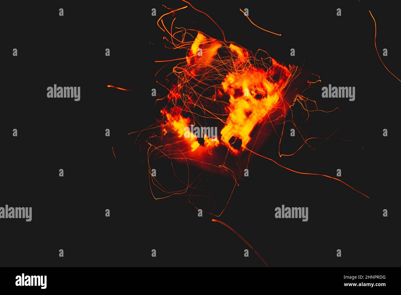 Fire flames with sparks in the dark background. bonfire at night Stock ...