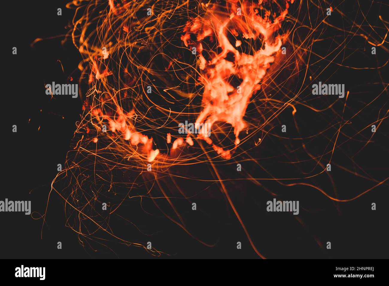 Fire flames with sparks in the dark background. bonfire at night Stock ...