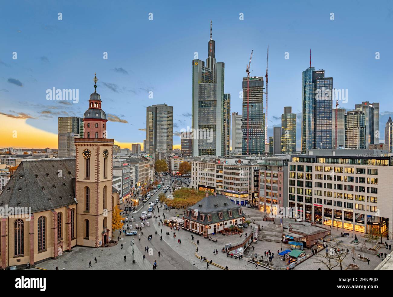 view to Hauptwache, a former central guard house and the skyline of Frankfurt in Sunset Stock Photo