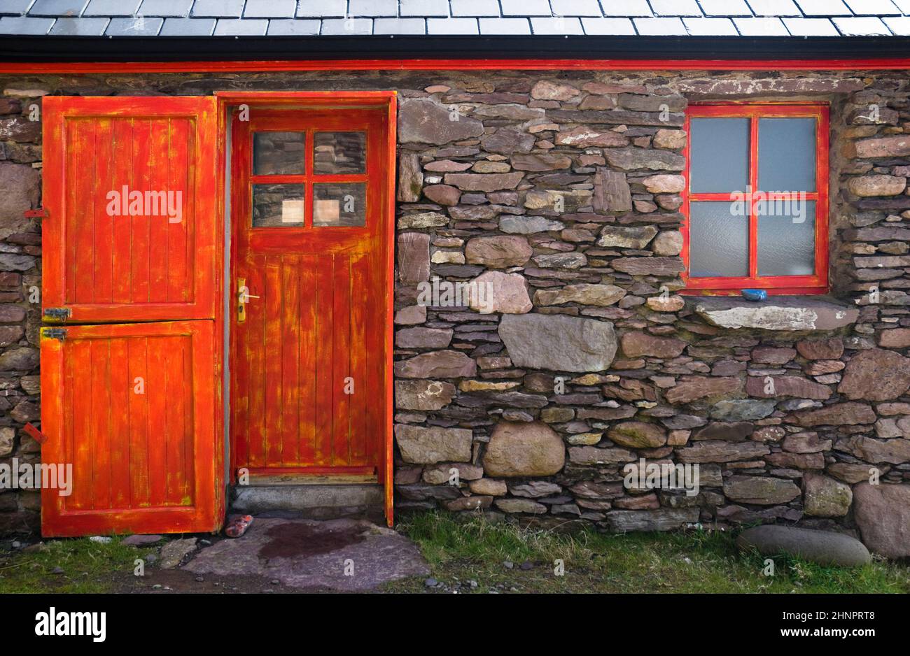 Old historic stone cottage door and window, County Kerry, Ireland Stock