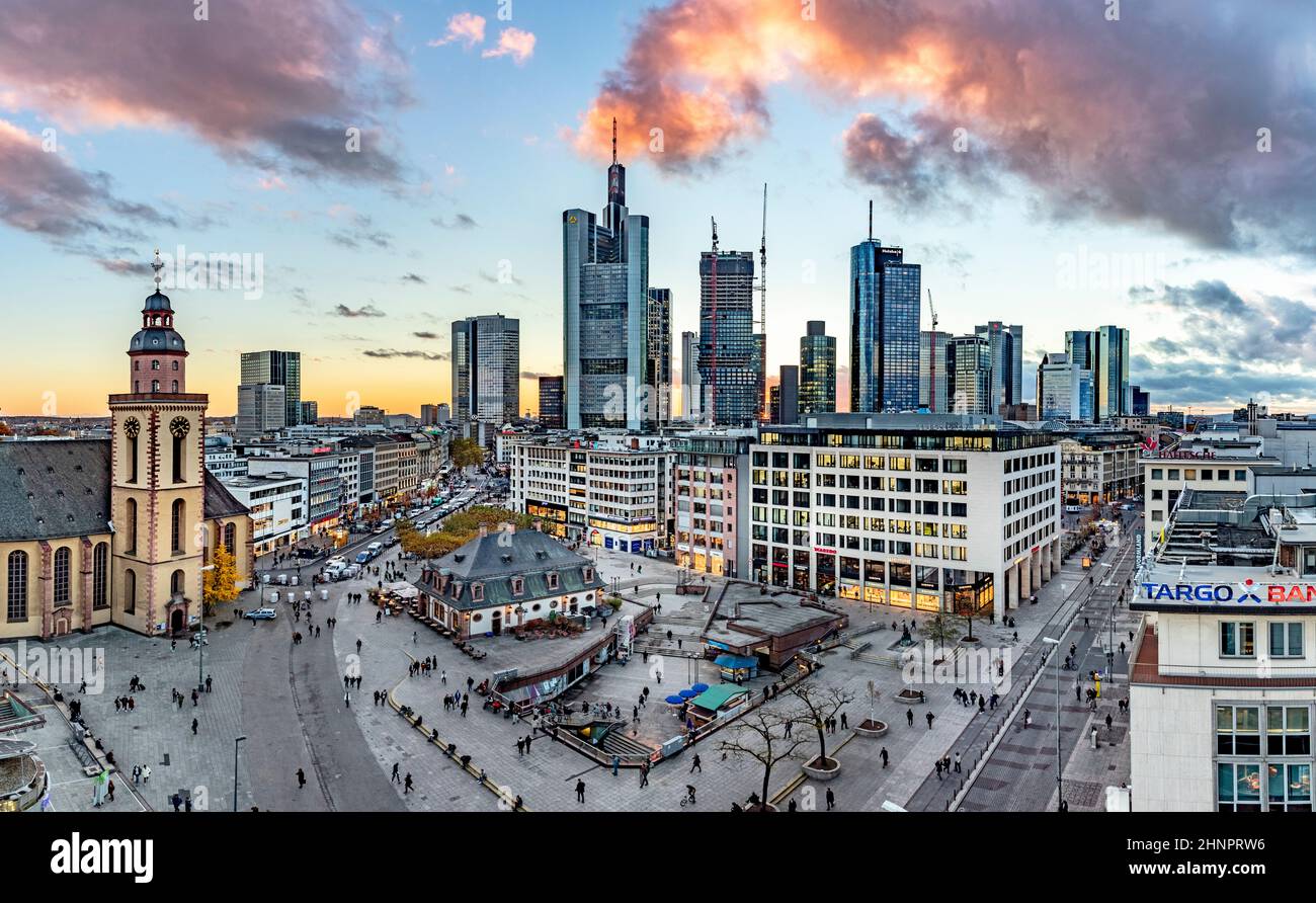 view to Hauptwache, a former central guard house and the skyline of Frankfurt in Sunset Stock Photo
