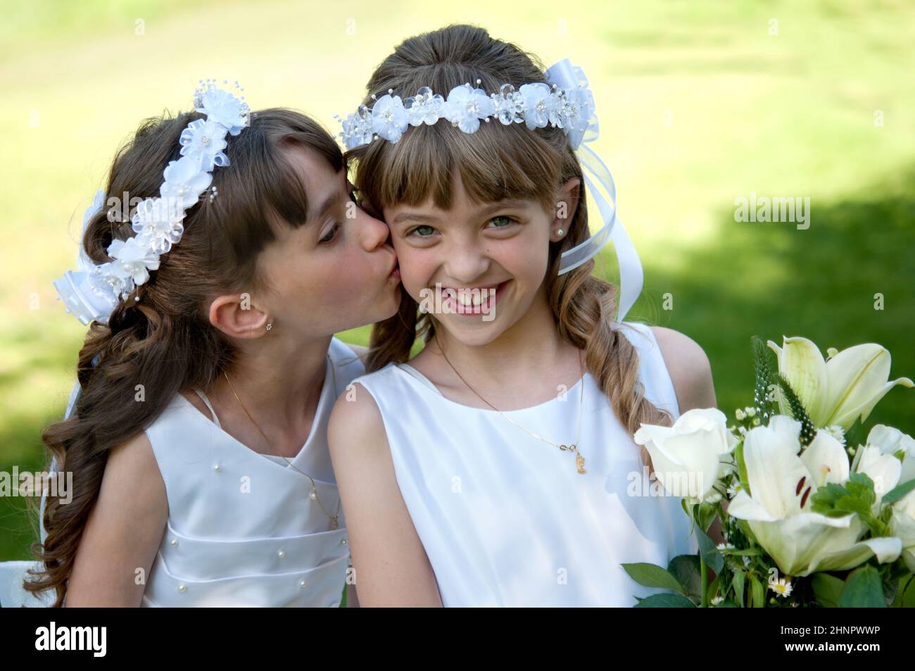 Young girls doing her catholic first holy communion Stock Photo - Alamy