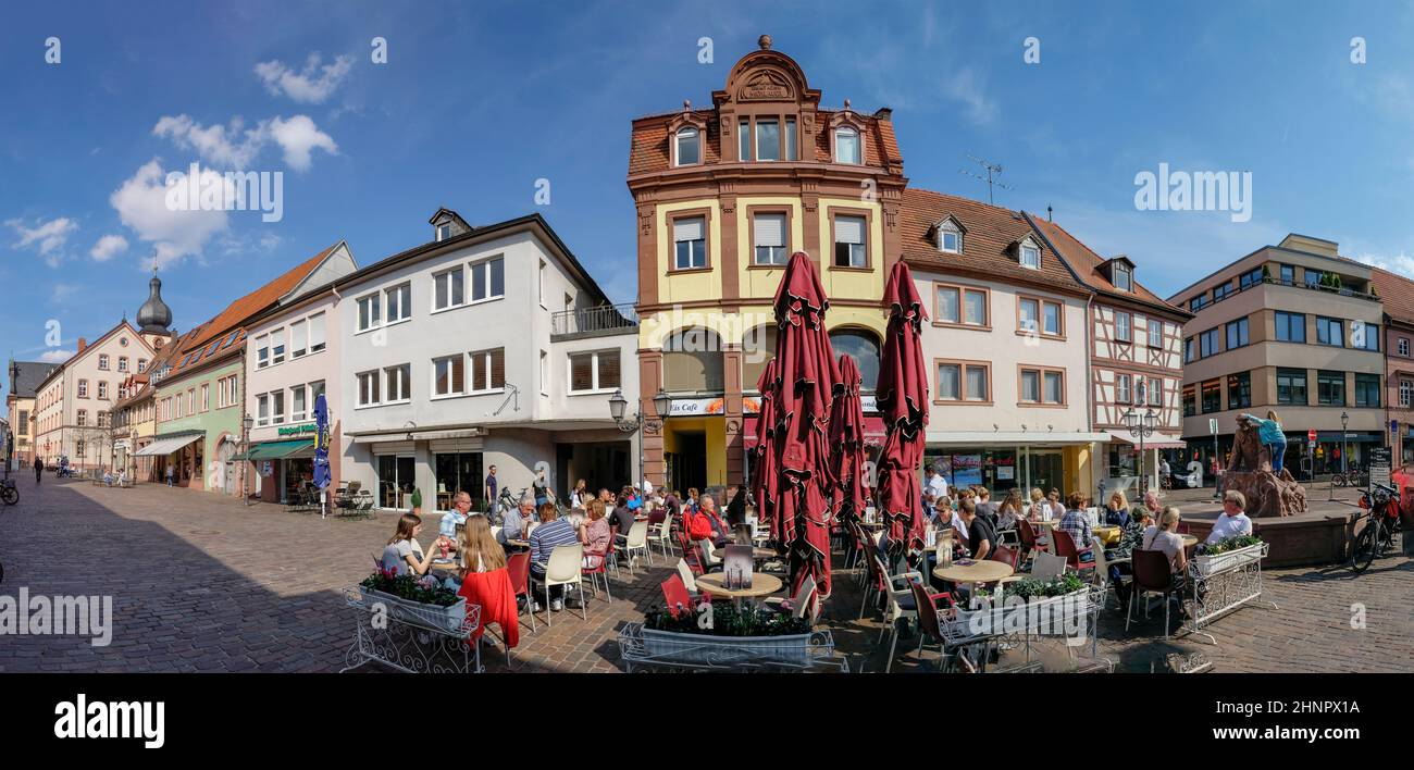 people enjoy a warm summer das at the historic central market place in Marktheidenfeld, Germany Stock Photo