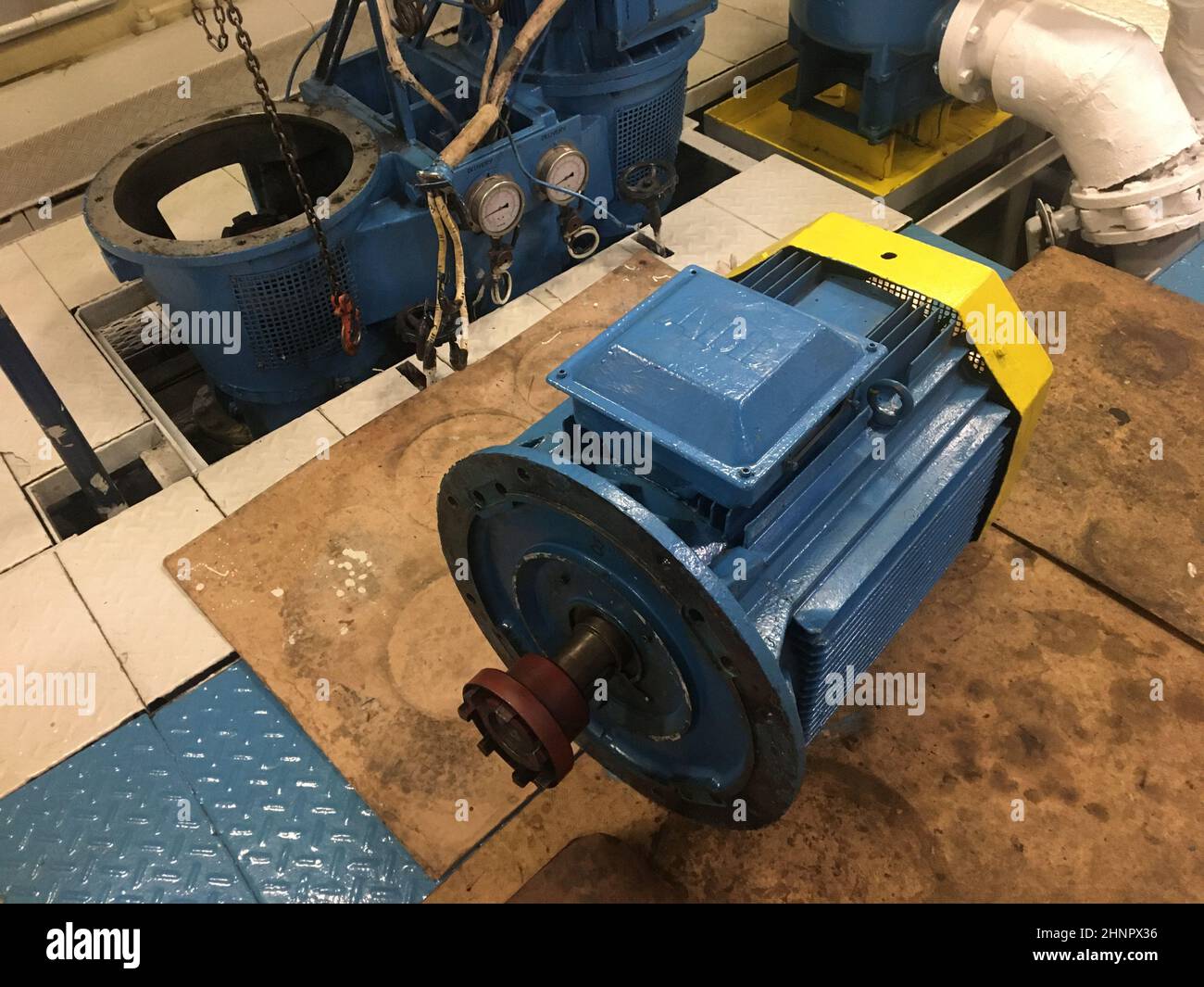 ships crew doing electrical motor repair,bearing replacement of