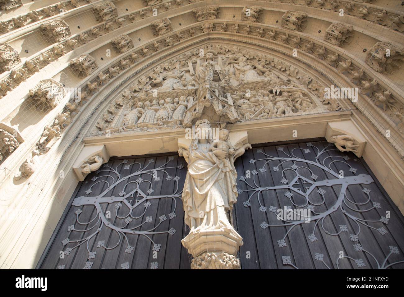 the tympanum shows the Coronation of the Virgin portal of the Marienkapelle in Wurzburg, Bavaria, Germany Stock Photo