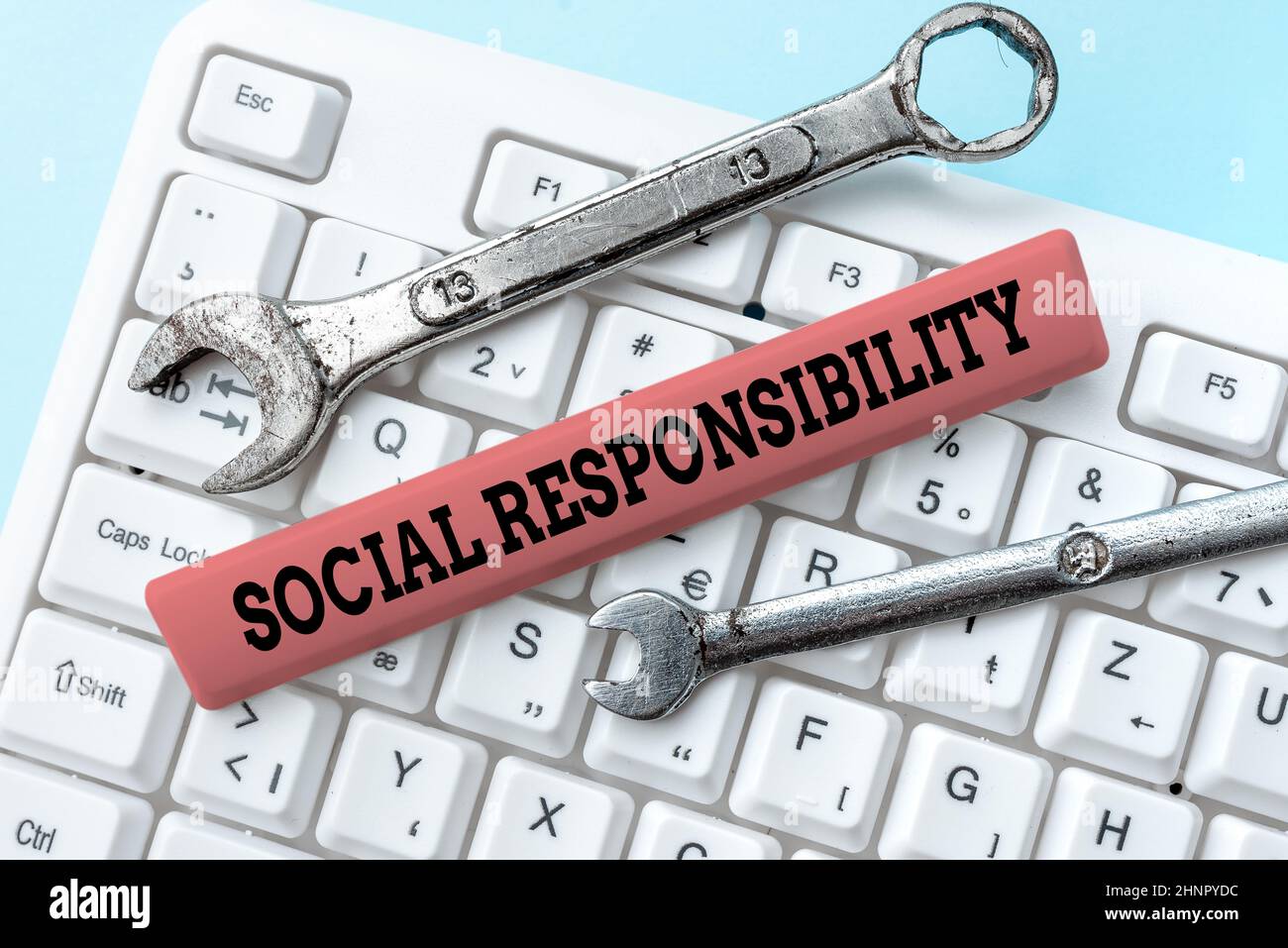 Handwriting text Social Responsibility. Word for Obligation for the Benefit of Society Balance in life Downloading Online Files And Data, Uploading Programming Codes Stock Photo