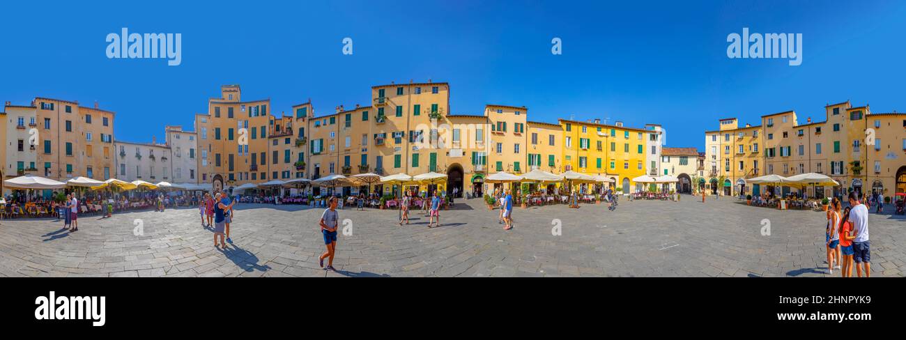 Beautiful colorful square - Piazza dell Anfiteatro in Lucca. Tuscany, Italy Stock Photo