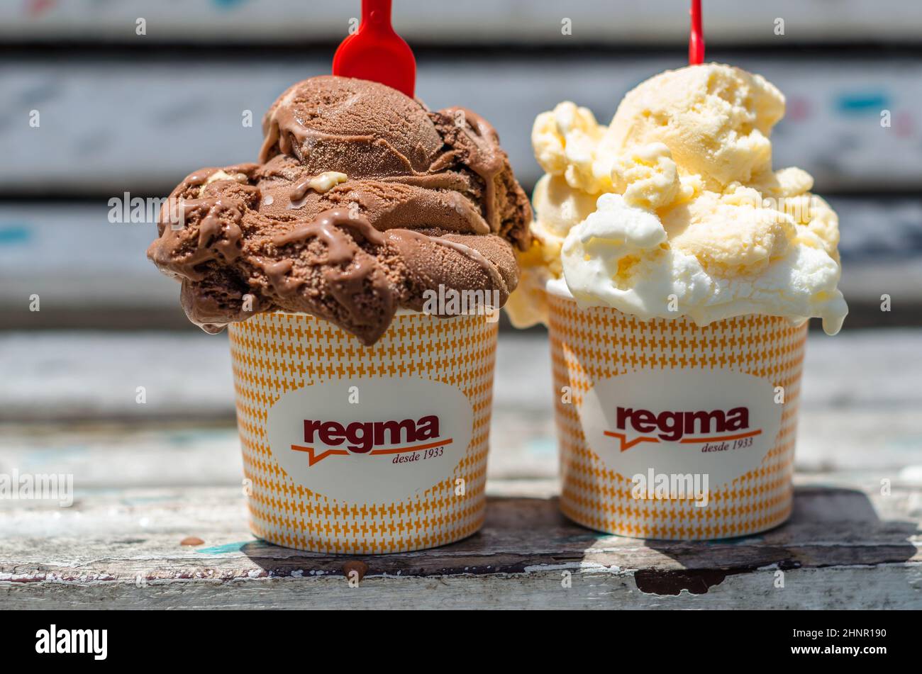 SANTANDER, SPAIN - JULY 11, 2021: Two pots of Regma ice cream. Regma ice cream shop, founded in Santander in 1933, is famous in northern Spain Stock Photo