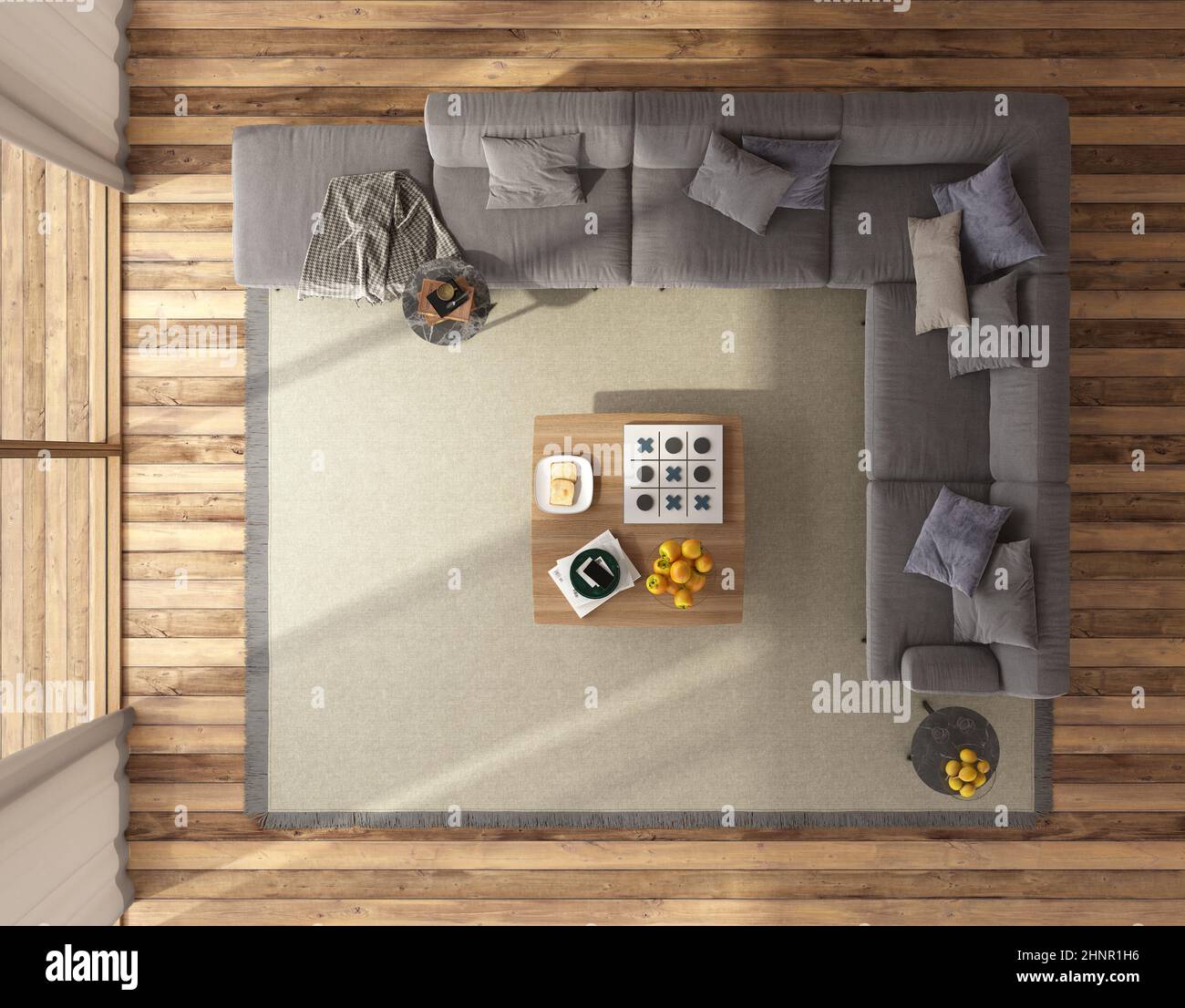 Top view of a modern living room with large sofa and coffee table on