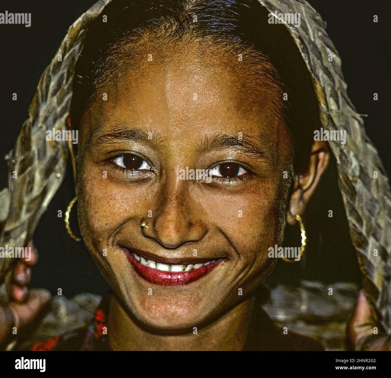 young female girl is happy and smiles in Pokhara, Nepal Stock Photo