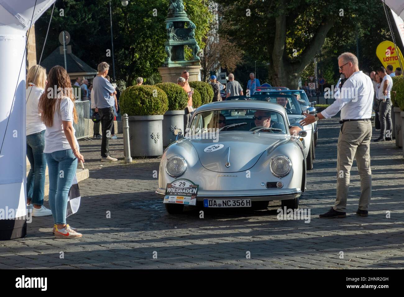 the Porsche 356A reaches the final goal  of the Oldtimer ralley Wiesbaden in Wiesbaden after a challenge in the Rheingau, Germany. Stock Photo