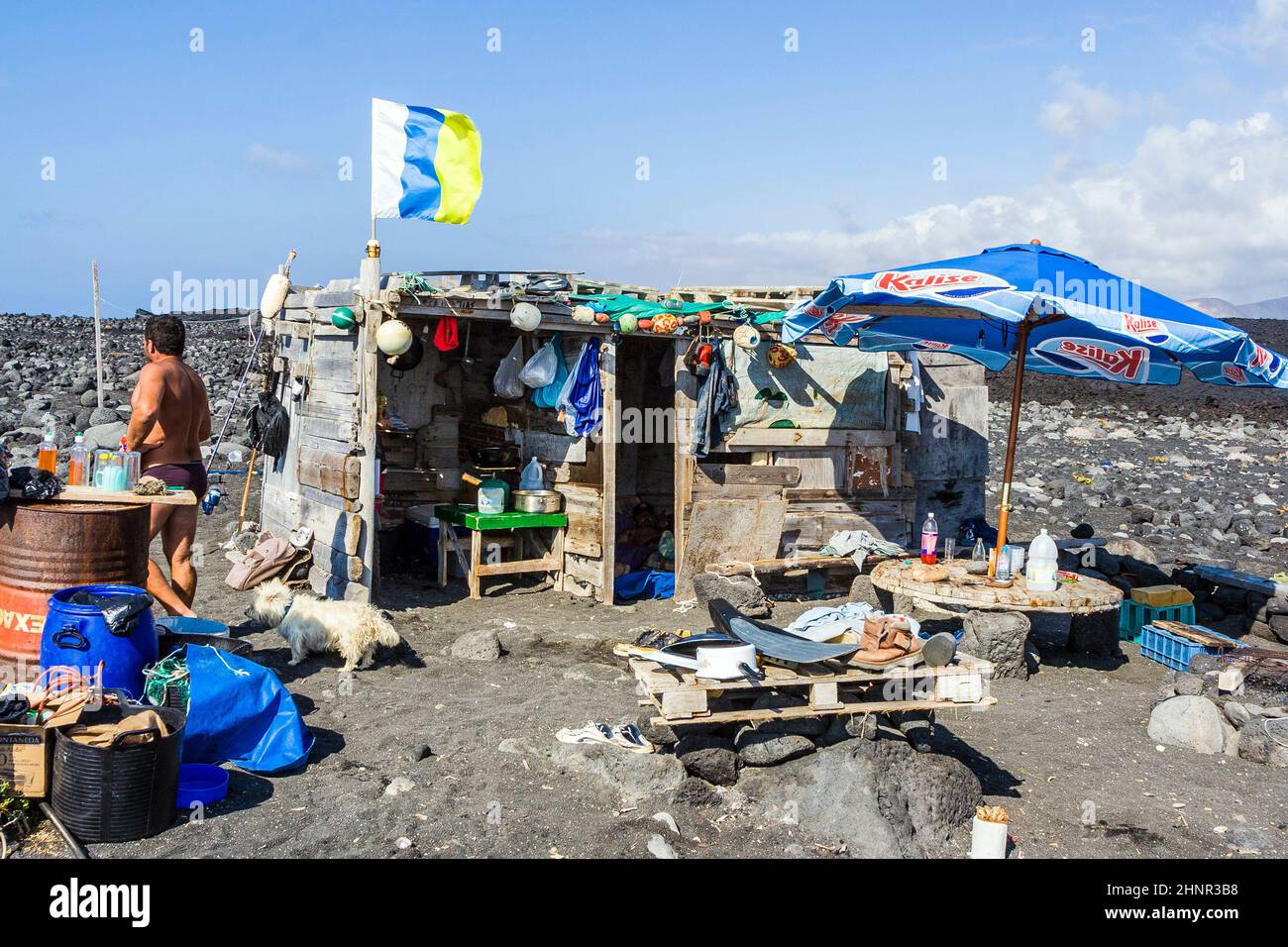 people at a fishermans hut in Timanfaya, Lanzarote Stock Photo