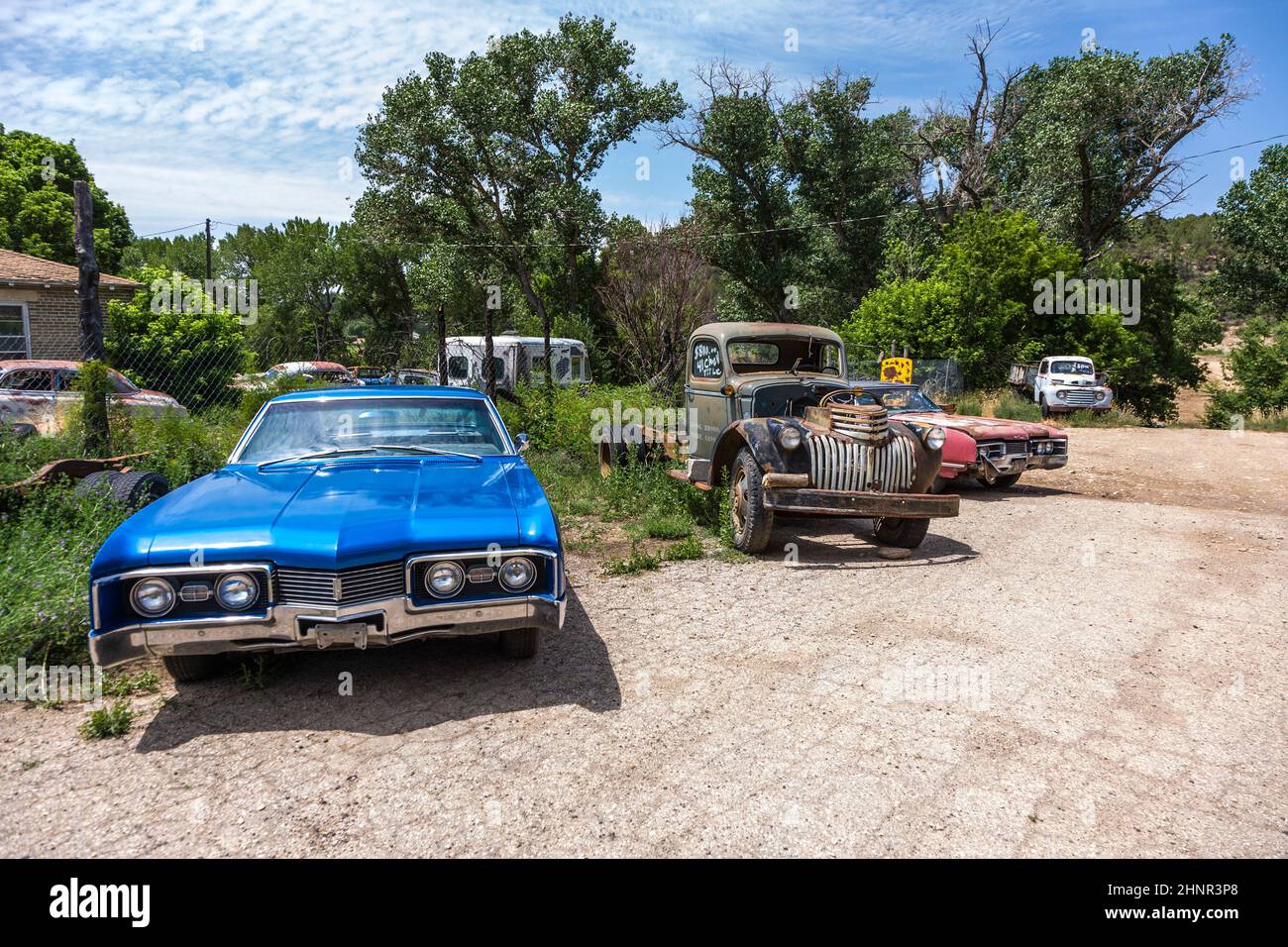 junk yard with old beautiful oldtimers Stock Photo - Alamy