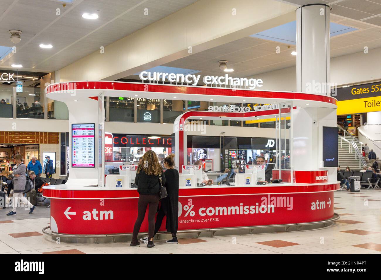 Moneycorp Currency Exchange kiosk in departures, North Terminal, London Gatwick Airport, Crawley, West Sussex, England, United Kingdom Stock Photo