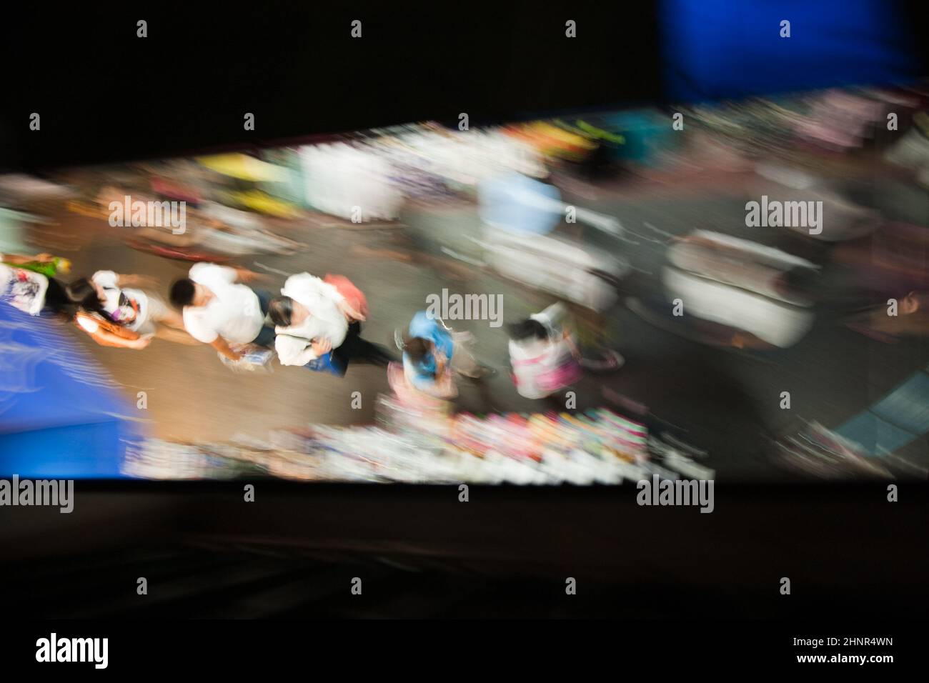 people are walking on the sidewalk Stock Photo