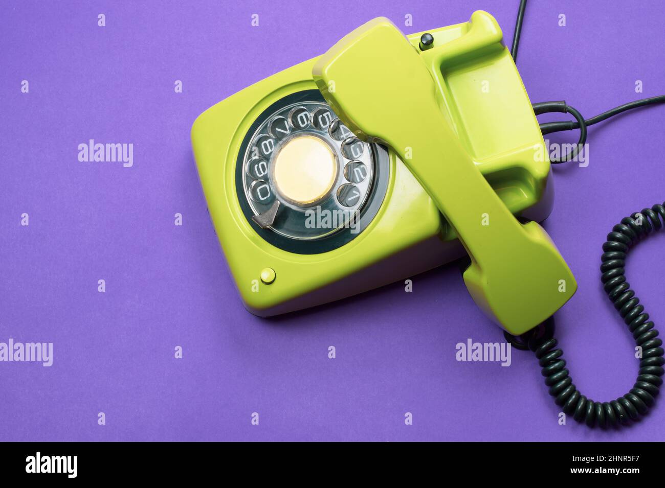 Phone with handset. vintage green telephone with phone receiver. office background. old
