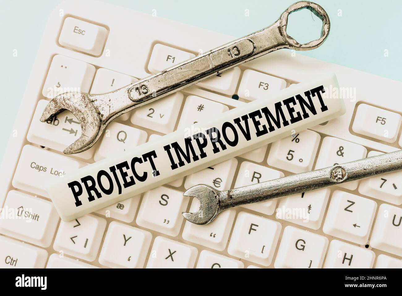 Text sign showing Project Improvement. Business approach Methods Techniques to accomplish a defined Objective Typing Device Instruction Manual, Posting Product Review Online Stock Photo