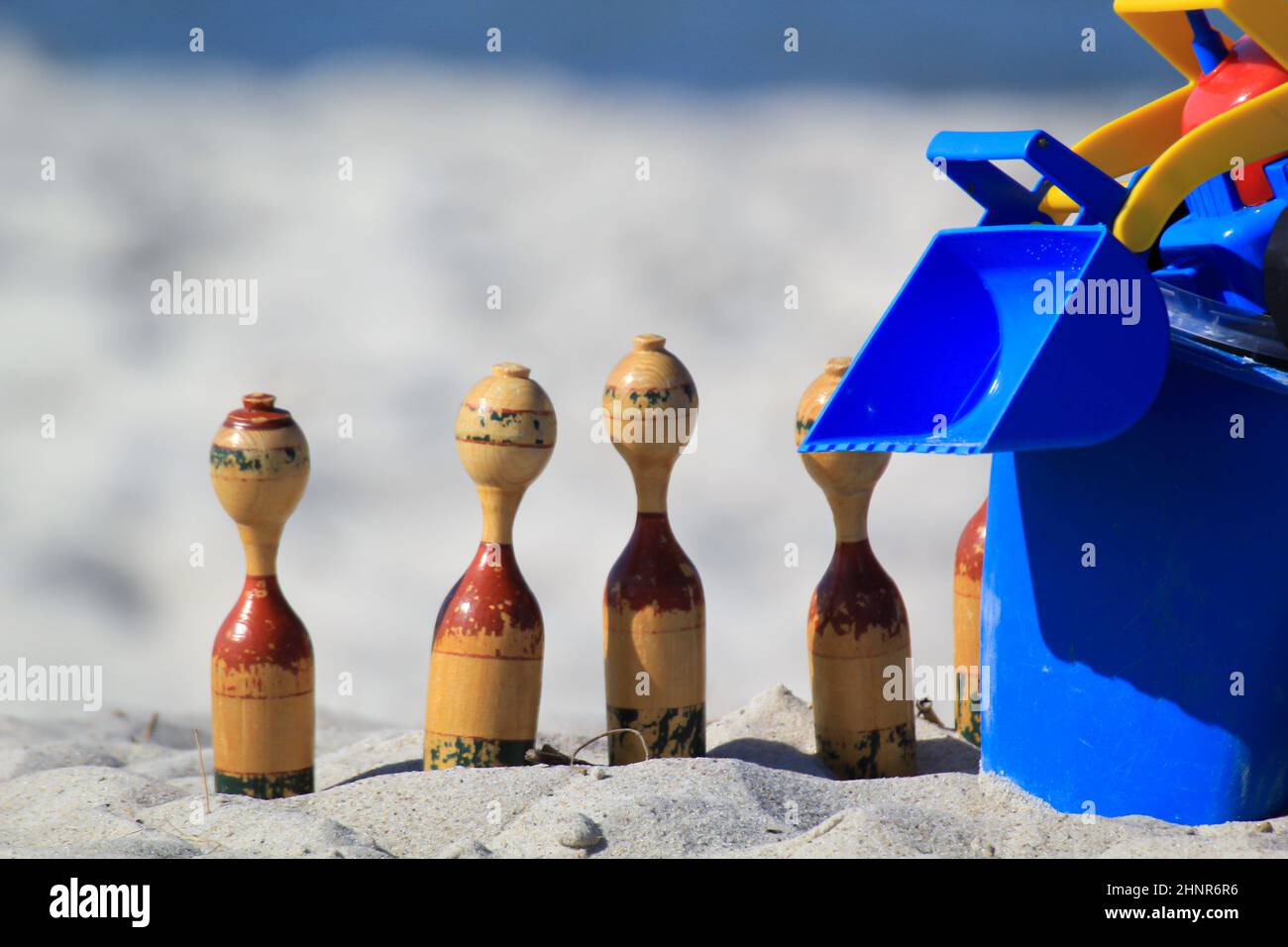 Childrens toys on the beach of the Baltic Sea. Sandpit toys. Stock Photo