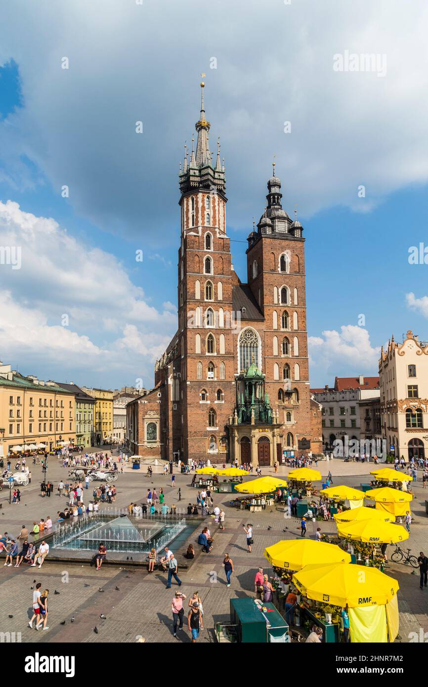 people visit Mariacki church, Church of Our Lady in Krakow Stock Photo
