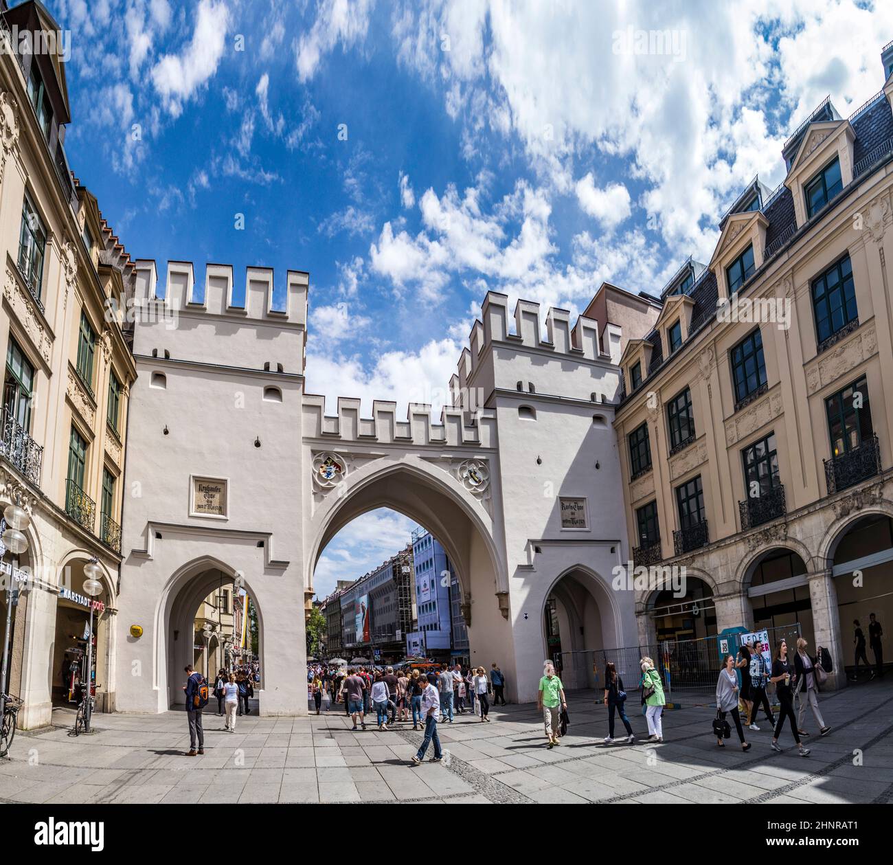 People walking along through the Karlstor gate in Munich Stock Photo