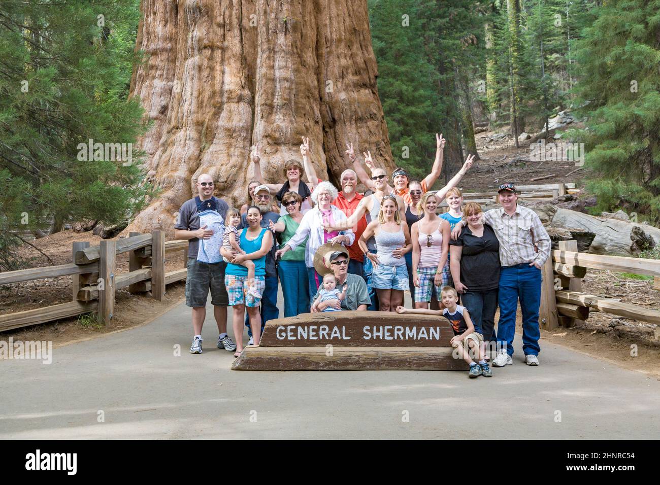people have a selfie in front of General sherman tree in the sequoia national park Stock Photo