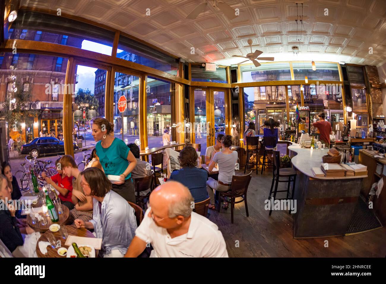 tourists and local people enjoy the restaurant at the Orchard stree Stock Photo