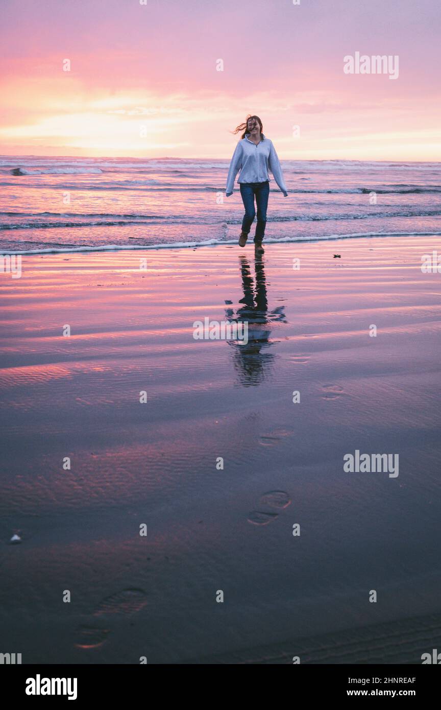 Female on the beach hi-res stock photography and images - Alamy