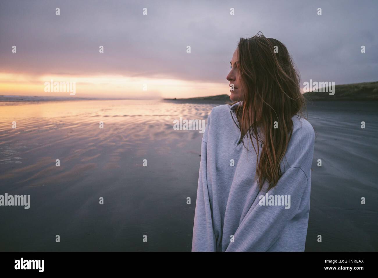 Female on the beach hi-res stock photography and images - Alamy