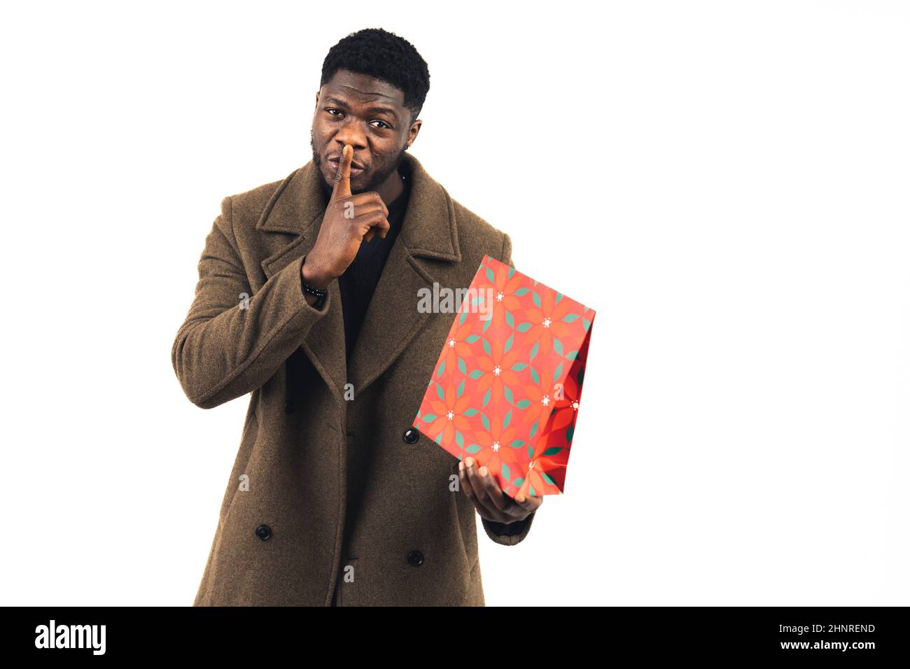 upcoming silent surprise black man white background - medium shot. High-quality photo Stock Photo