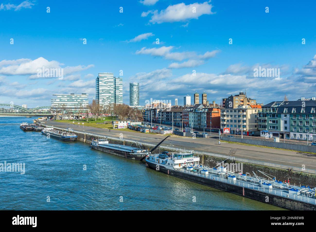 Cologne skyline with ships on pier Stock Photo