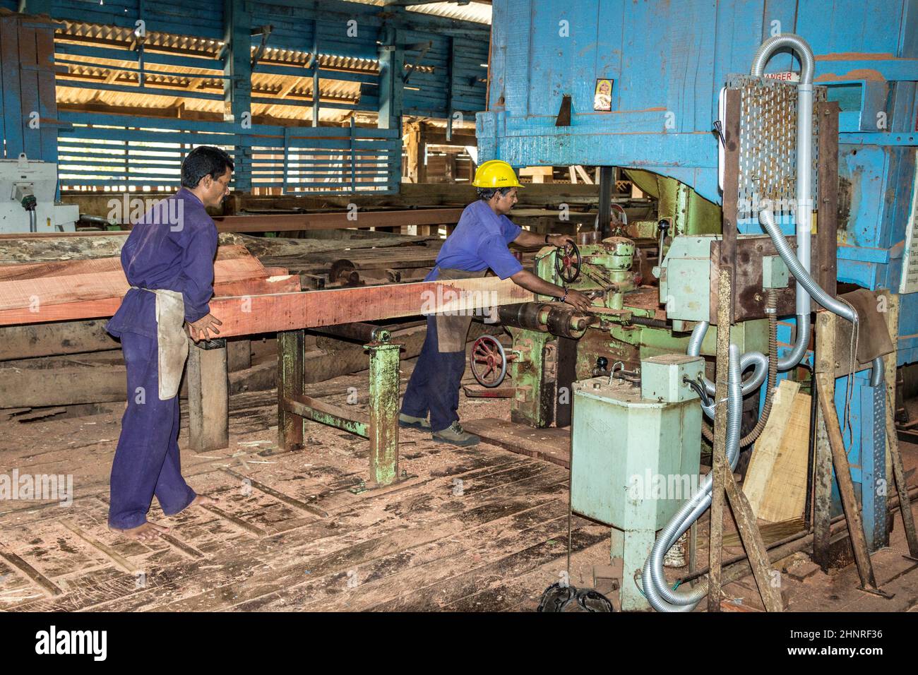people work at an an old furniture carpenters workshop with old ...