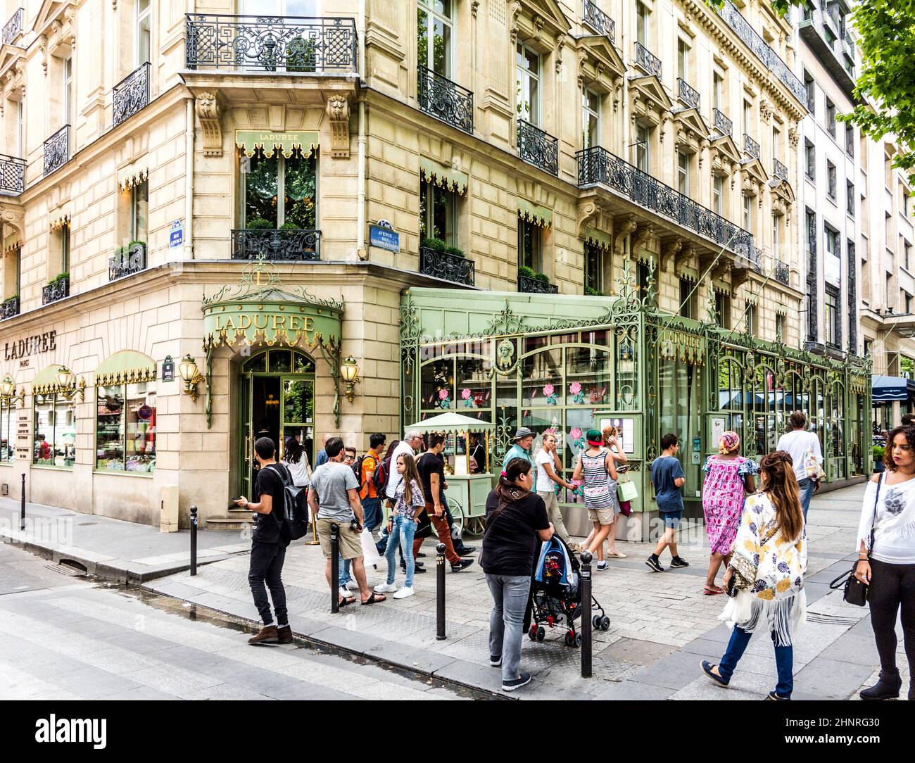 people in front of LADUREE shop at champs elysees Stock Photo