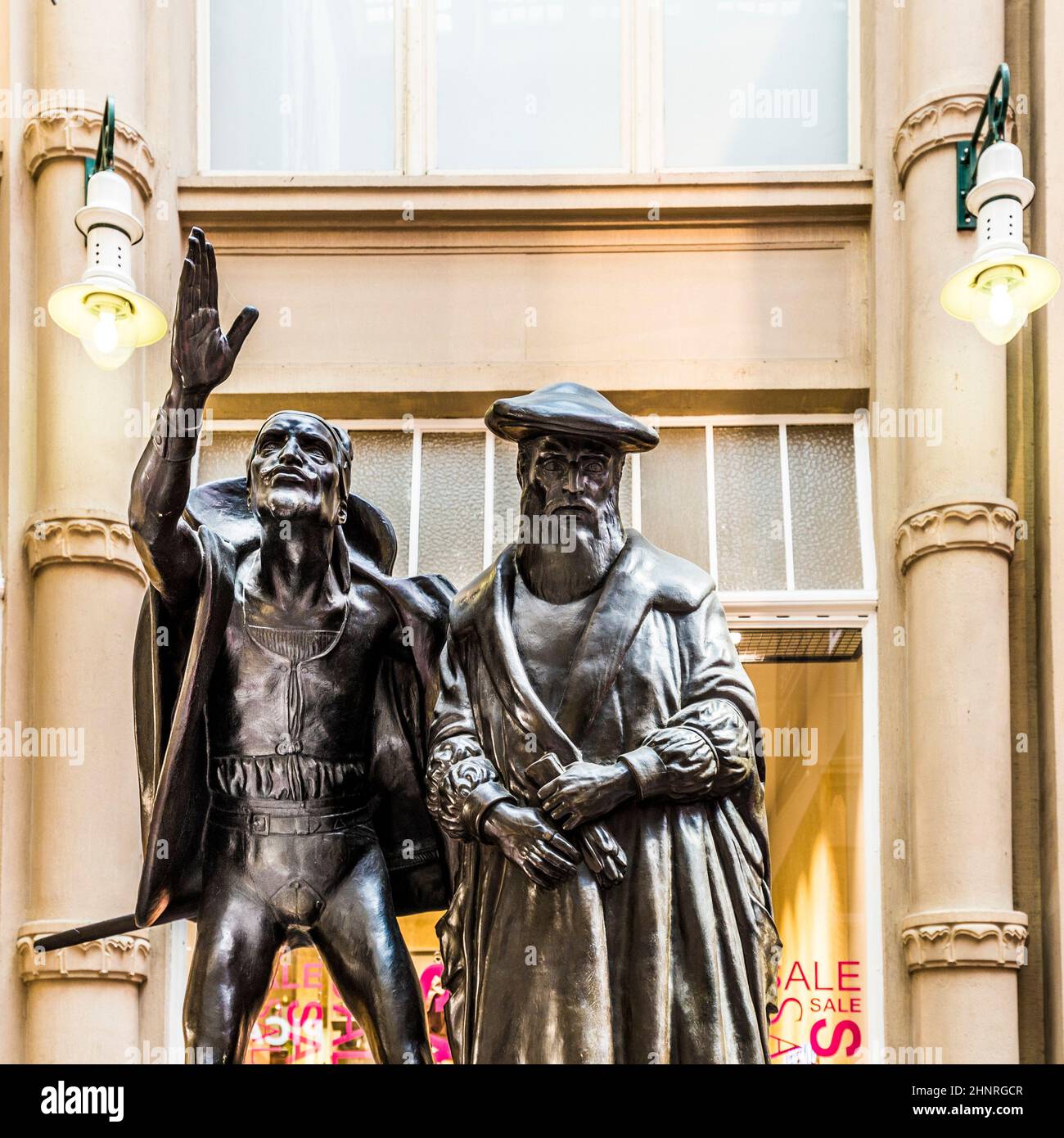 Sculpture of Mephistopheles bewitching the students in the scene Auerbachs Keller from Faust at the entrance of Auerbachs Keller pub in Leipzig Stock Photo