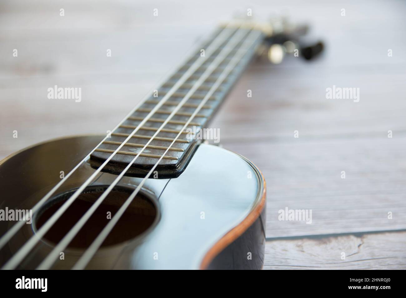 Ukulele black musical instrument close up Stock Photo Alamy