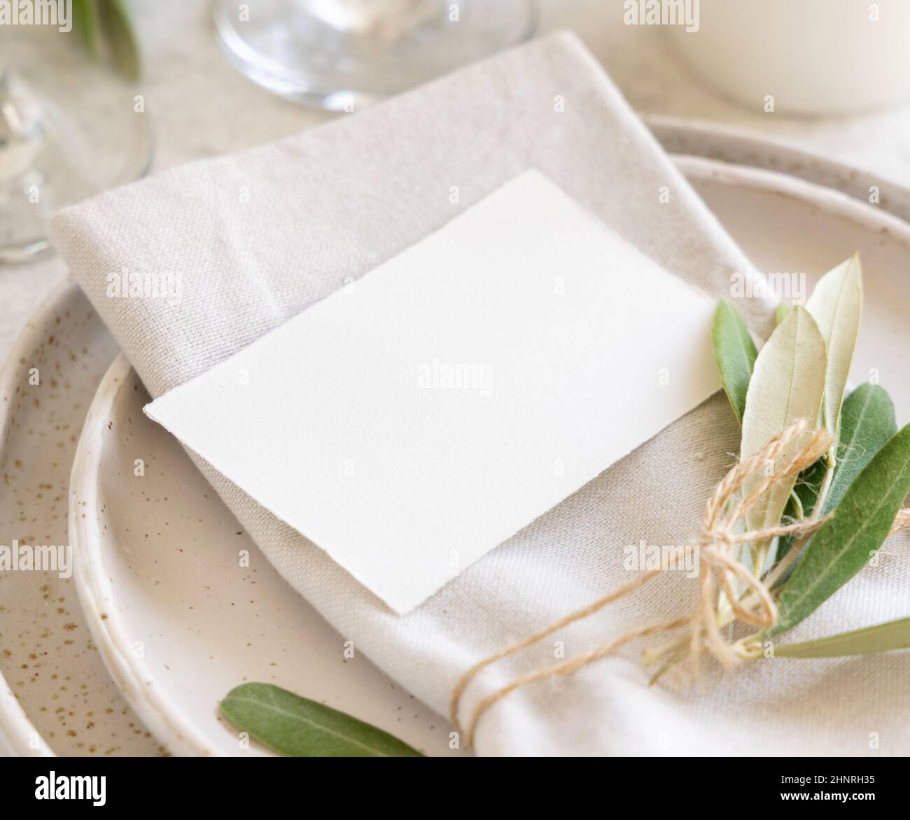 Wedding Table place with a place card and porcelain plates decorated