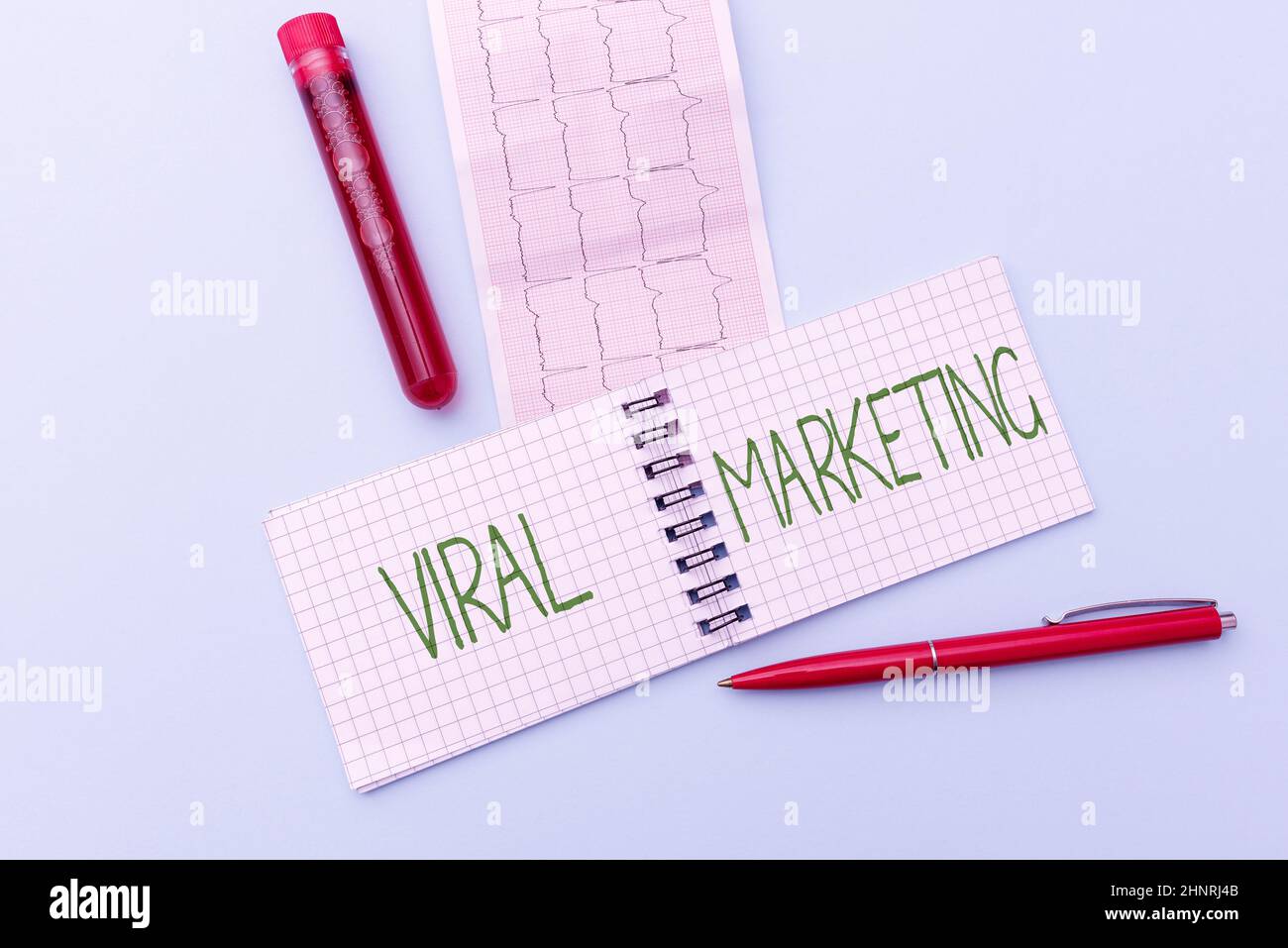 Inspiration showing sign Viral Marketing. Business concept whereby consumer encouraged share information via Internet Reading Graph And Writing Important Medical Notes Test Result Analysis Stock Photo