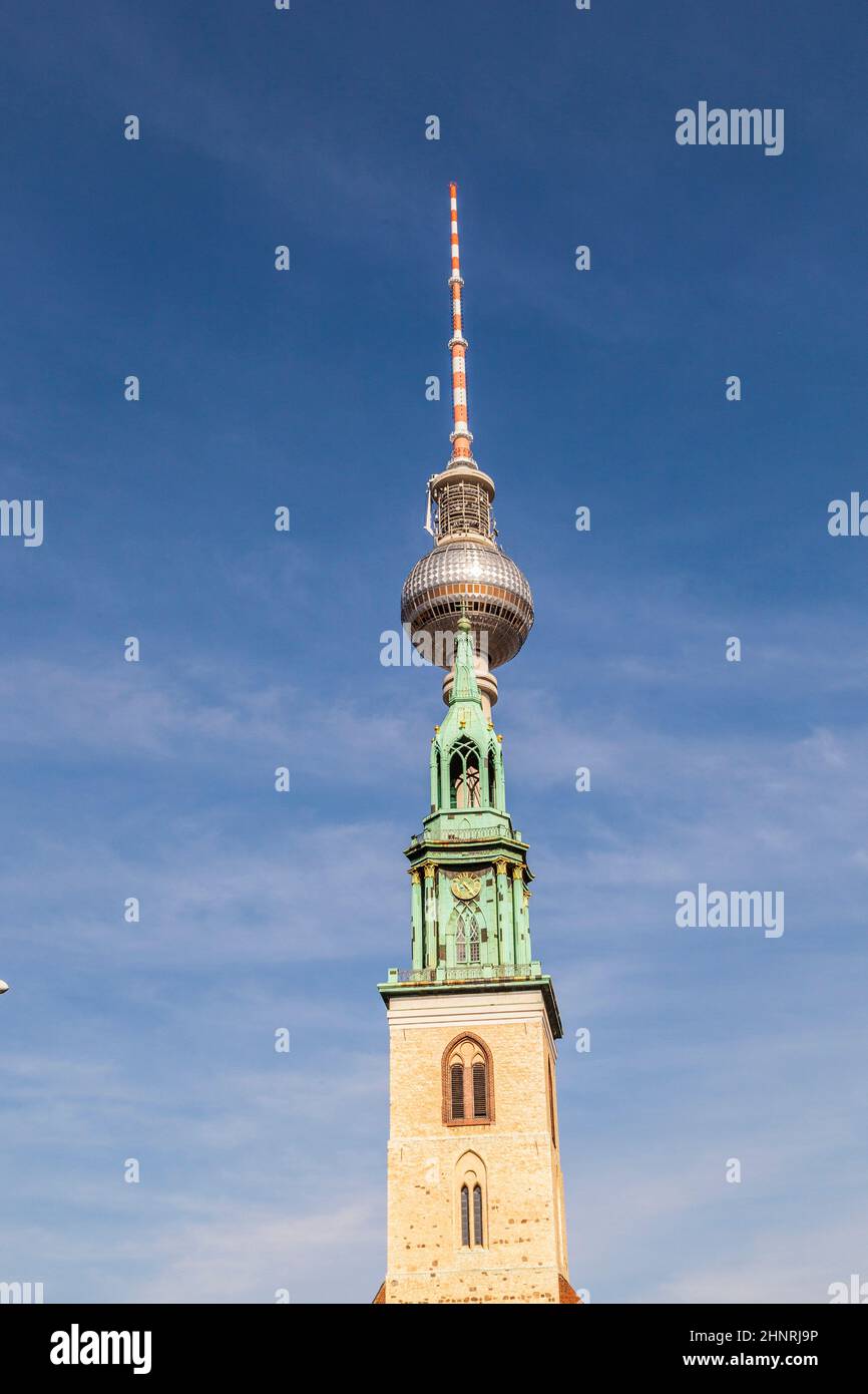 church and tv-tower at berlin, alexanderplatz Stock Photo
