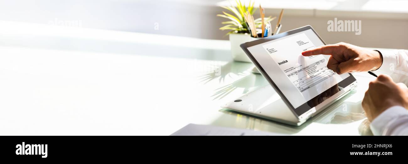 Online Digital E Invoice Statement On Hybrid Laptop Stock Photo